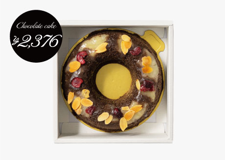 結婚祝いのお返し・内祝いにおしゃれなお菓子・旬のフルーツ_ホシフルーツ_生チョコがサンドされた、パイナップルやクランベリーのケーキ。